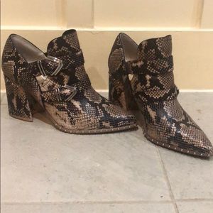 Snake skin booties by Gianni Bini